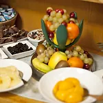 三盏灯斯考特而酒店 酒店 比戈